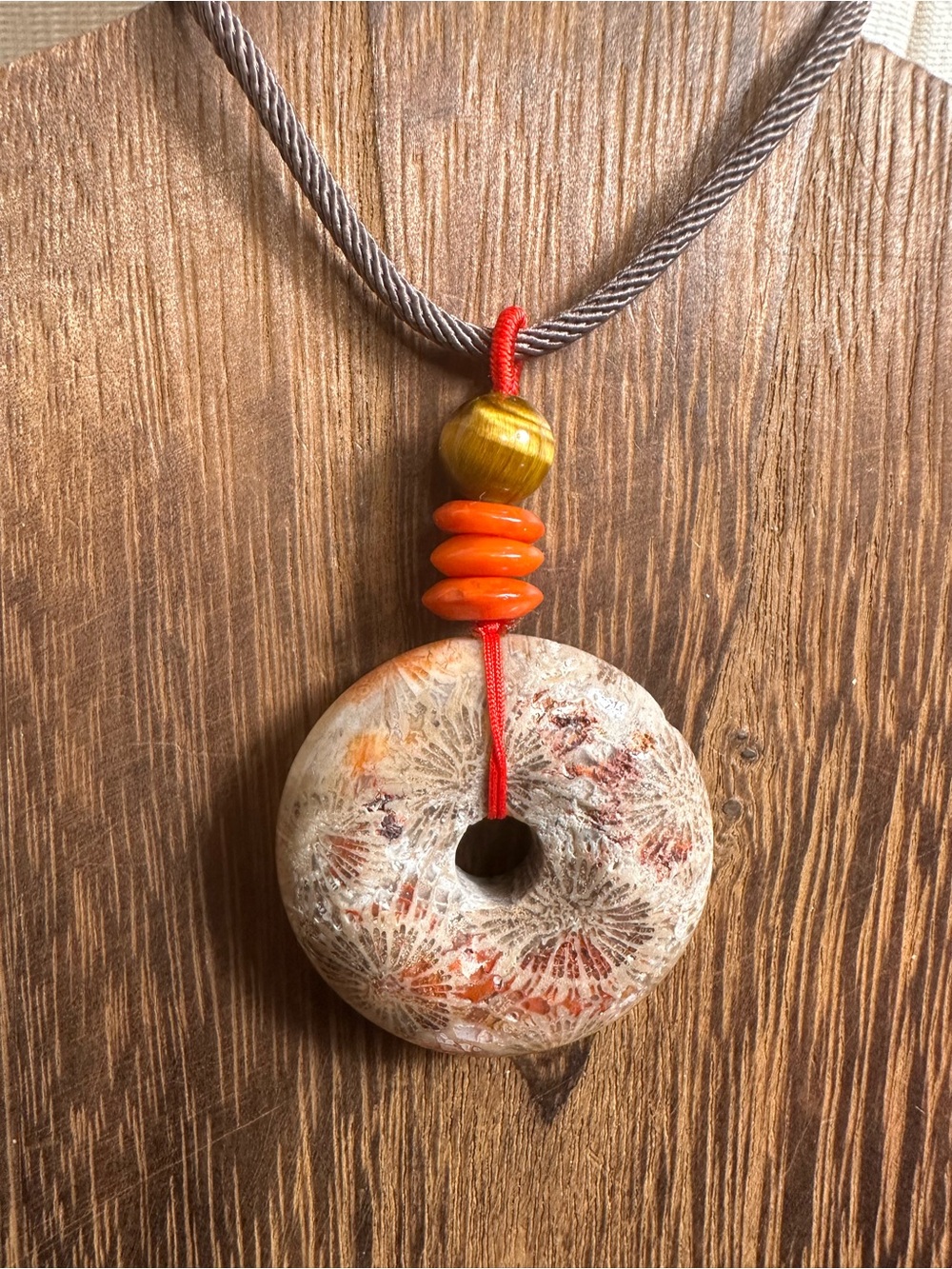 Handcrafted Red and Brown Coral Fossil Donut Pendant Necklace on Brown Rope - Picture 5 of 16